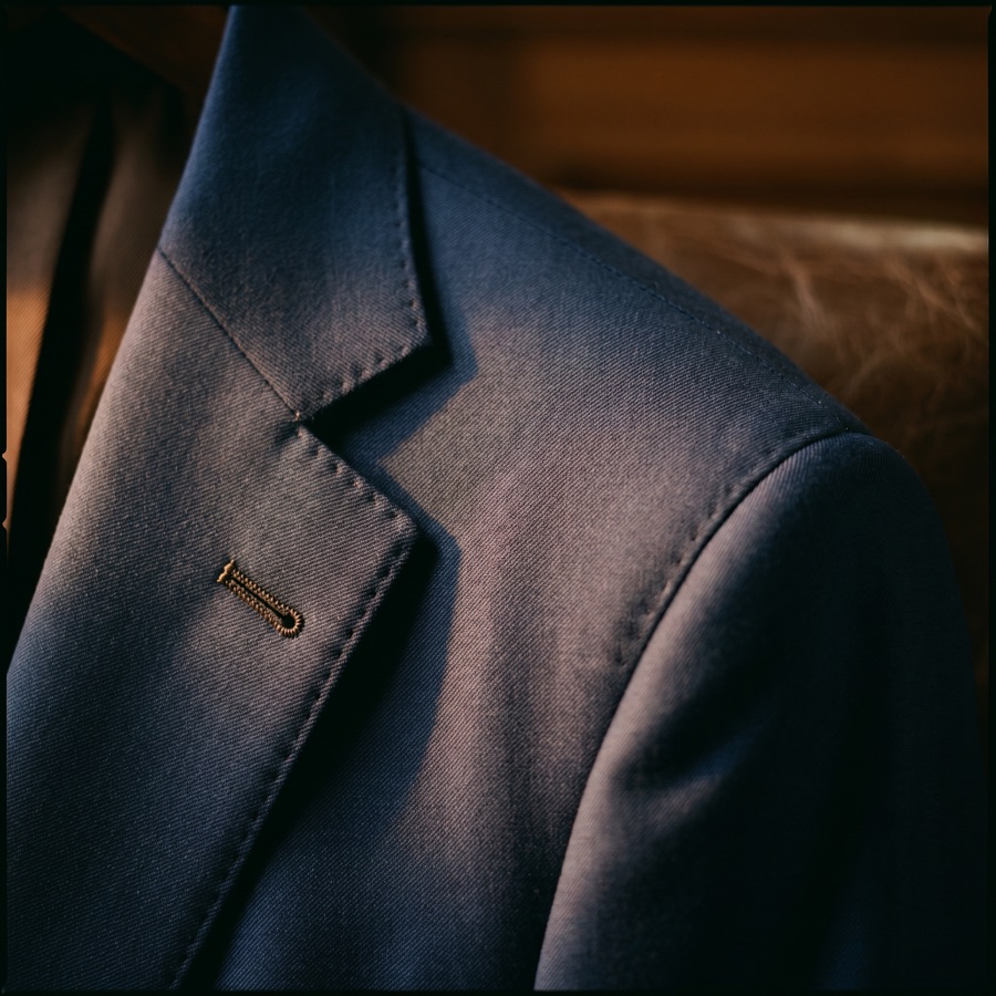 Macro detail of a suit lapel and buttonhole